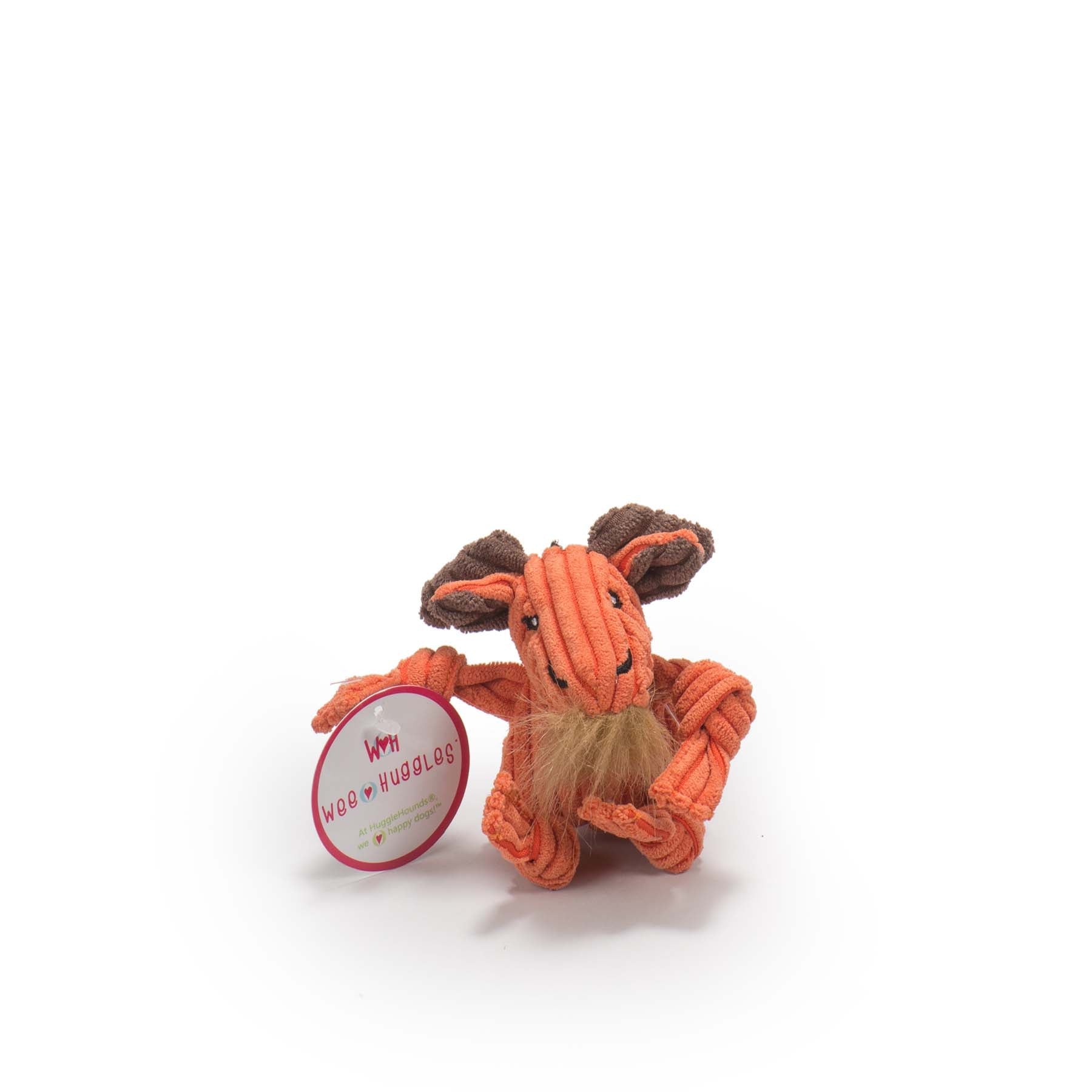 Orange dog toy shaped like a fox with a circular tag on a white background