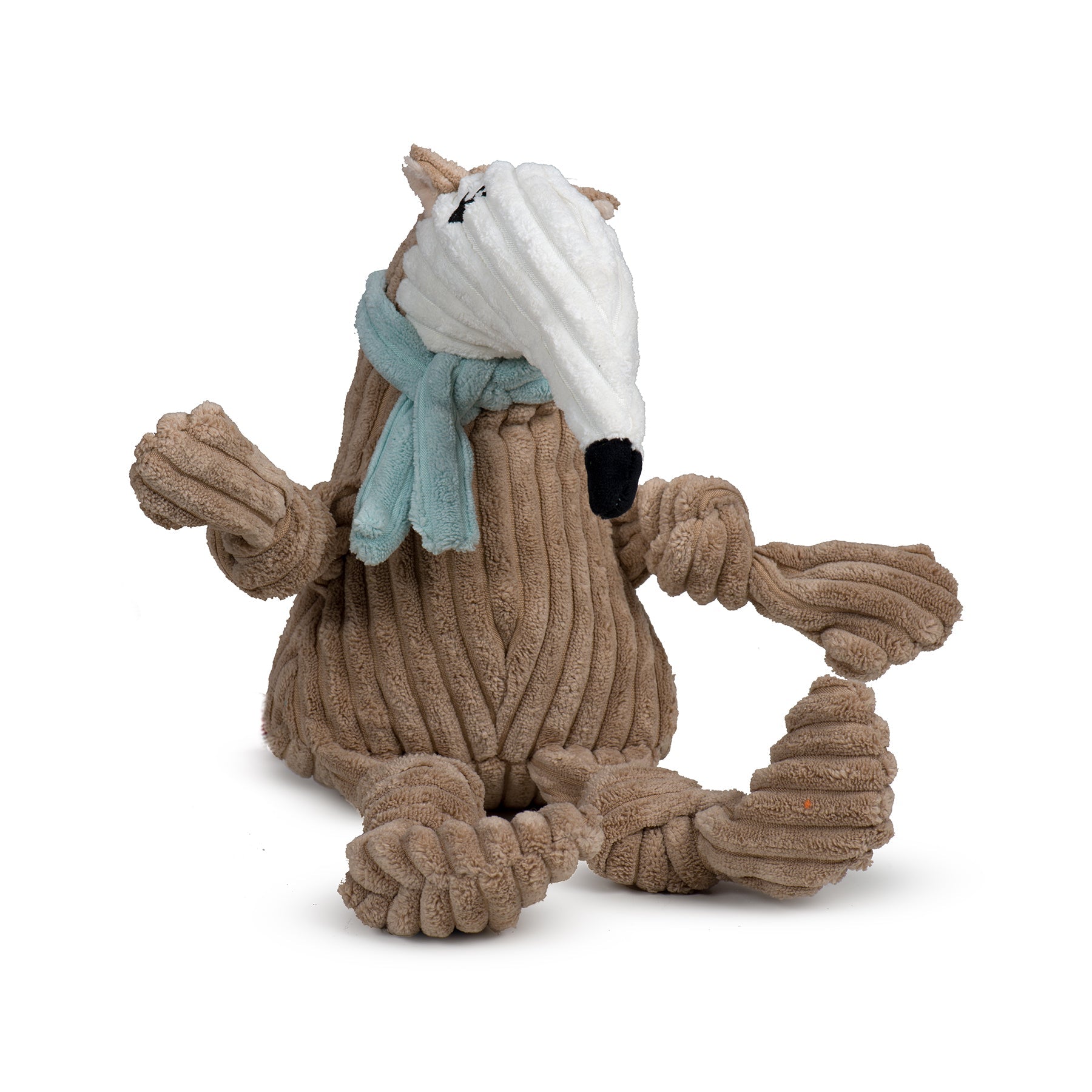 Plush toy resembling a fox with a knitted sweater and scarf on a white background
