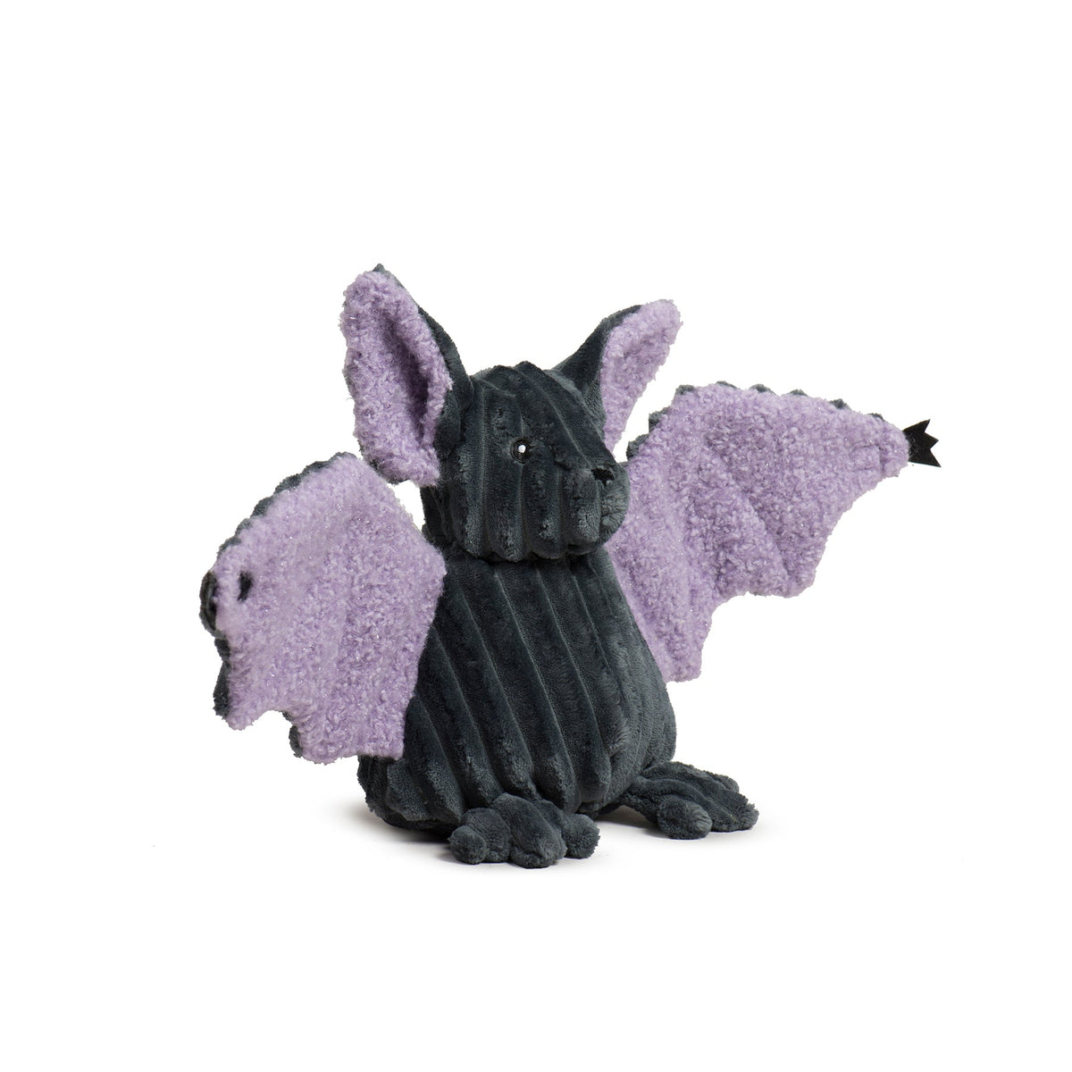 Plush toy dragon with purple wings on a white background