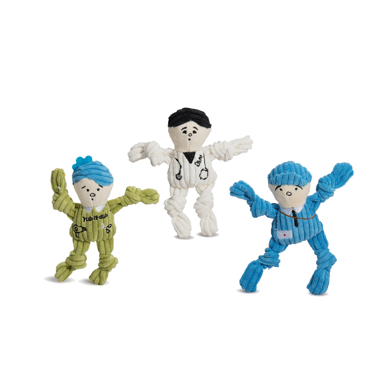Three colorful dog toys with different outfits on a white background