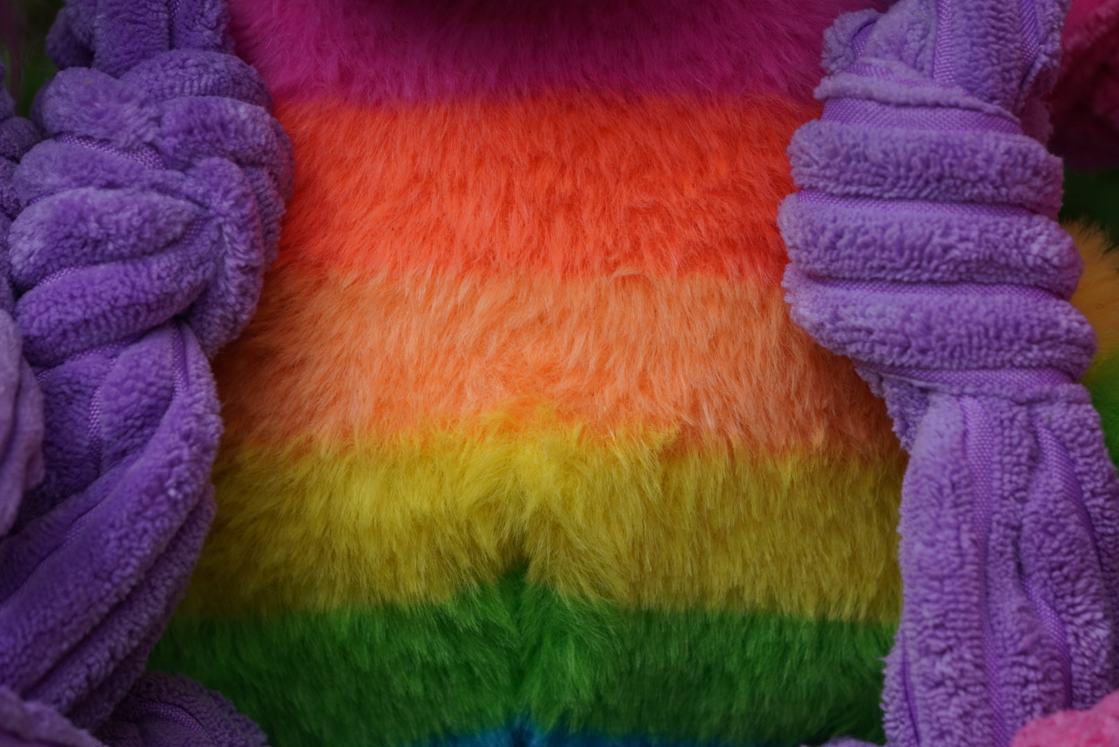 Close-up of colorful fluffy fabric with purple braided textures