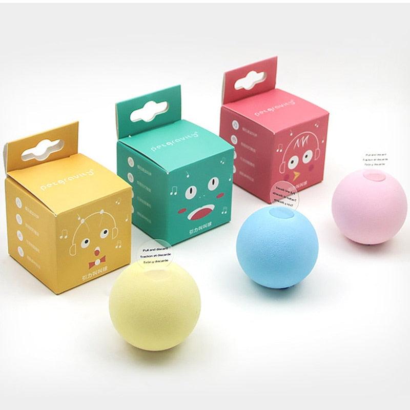 Colorful balls with matching packaging on a white background