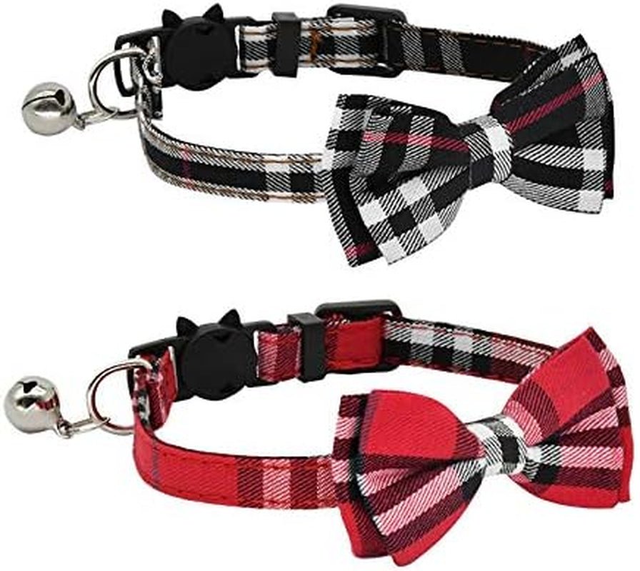 Two plaid dog collars with bow ties and bells on a white background