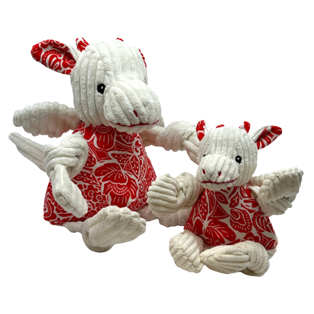 Two plush toys with white bodies and red patterned dresses on a white background