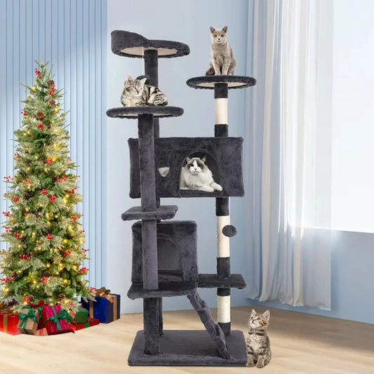 Cat tree with cats on various levels next to a decorated Christmas tree.