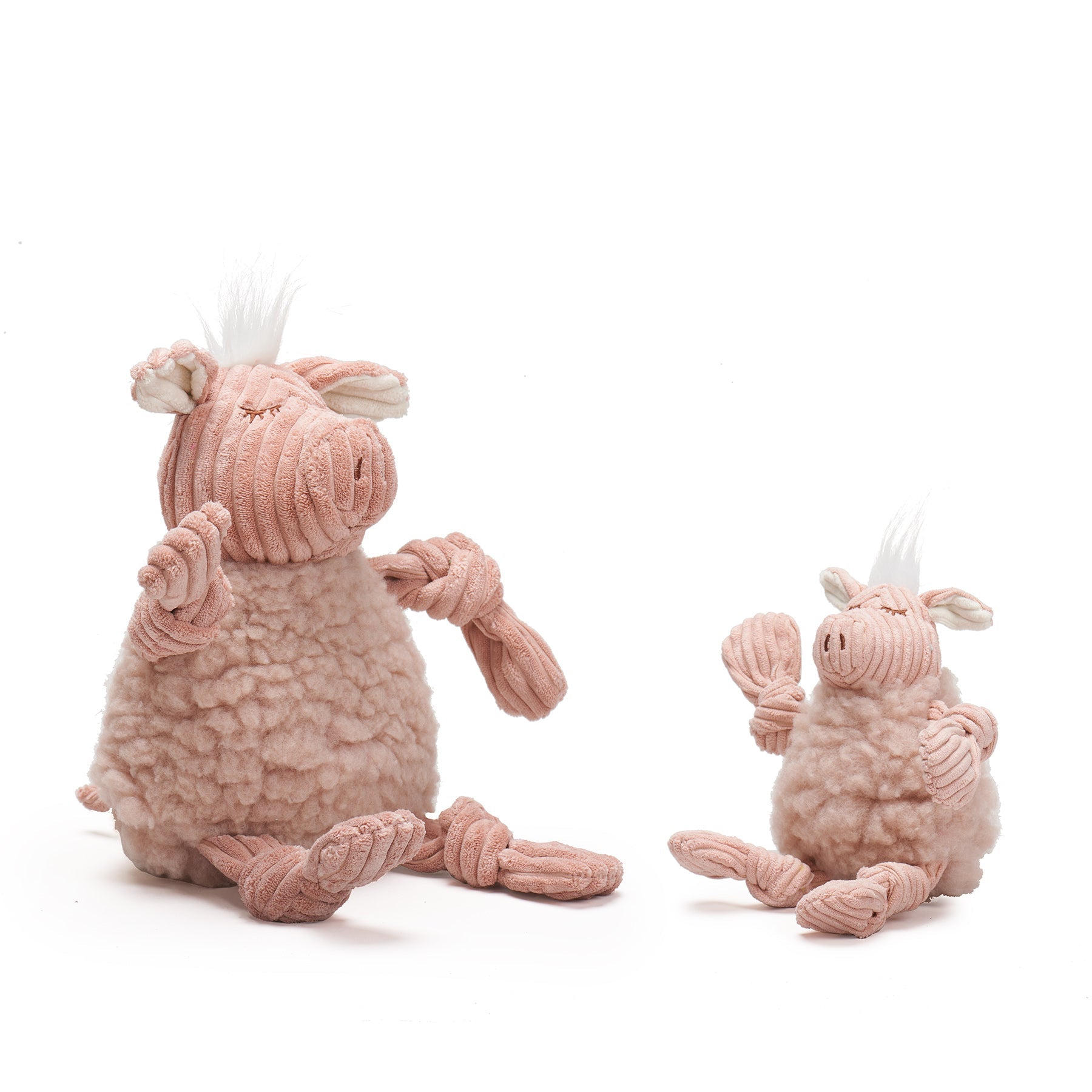 Two pink plush toys with rope handles on a white background