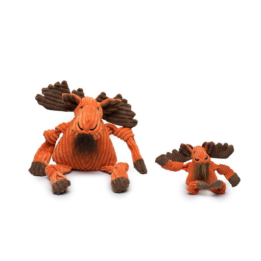 Two orange and brown moose-shaped toys on a white background