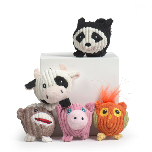Set of colorful knitted animal toys on a white background