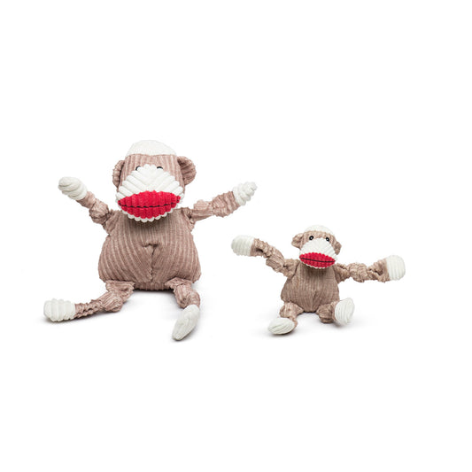 Two sock monkey toys on a white background