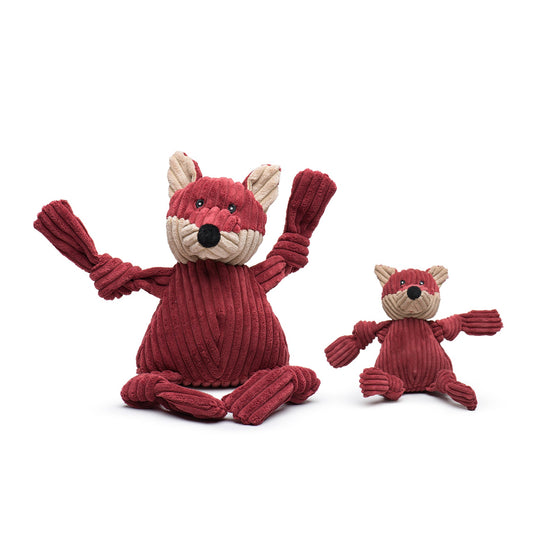 Two red plush fox toys on a white background