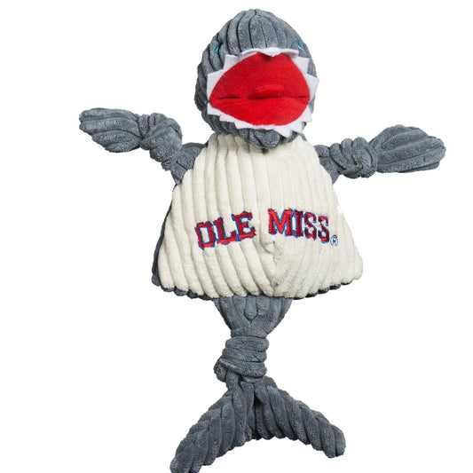 Dog toy shaped like a shark with 'DLE MISS' text on a white background
