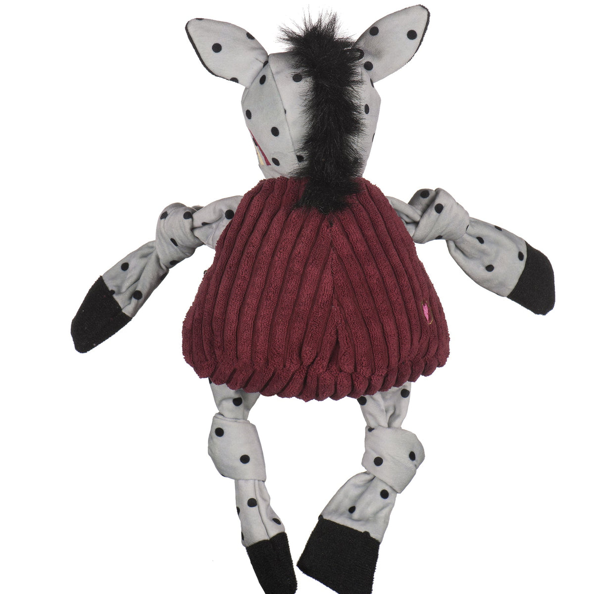 Toy zebra with a red sweater on a white background