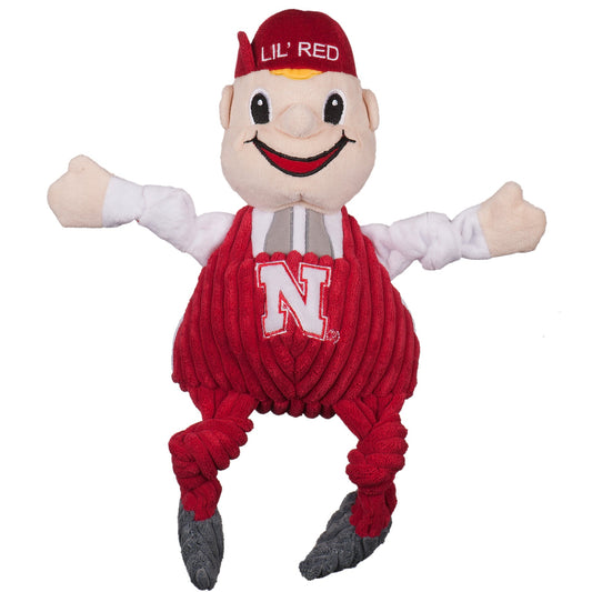Plush toy resembling a mascot character in red and white attire with 'Lil' Red' hat on a white background