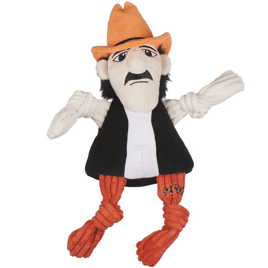 Plush toy resembling a character with an orange hat, black vest, and red pants on a white background
