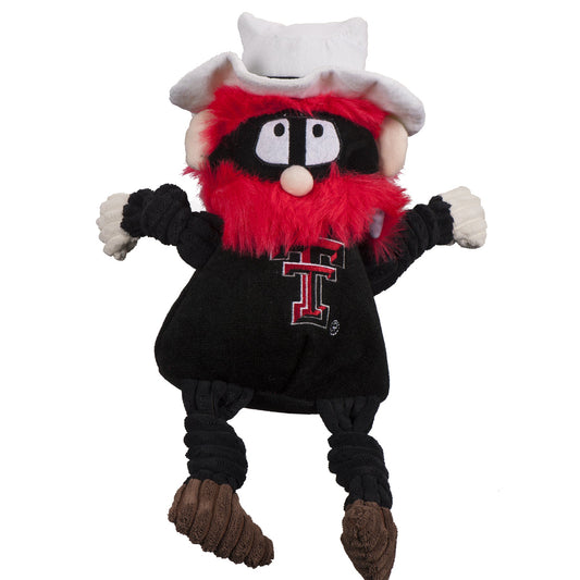 Plush toy resembling a cartoon character with a red and black outfit on a white background