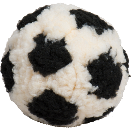 Black and white checkered ball with a textured surface on a white background