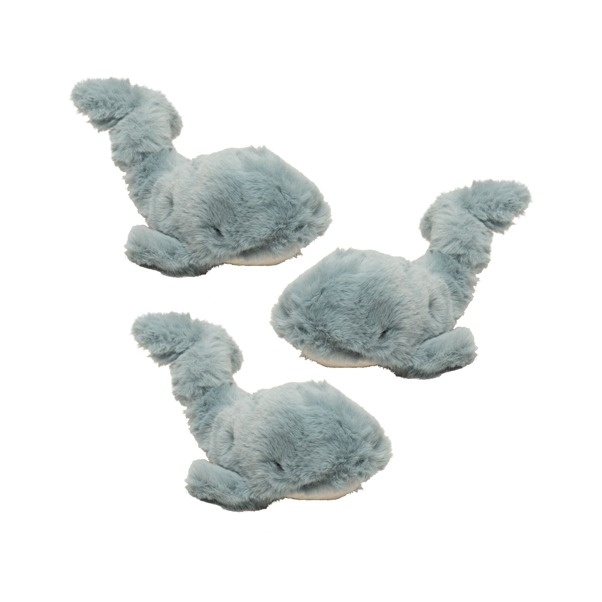 Set of three blue whale-shaped slippers on a white background