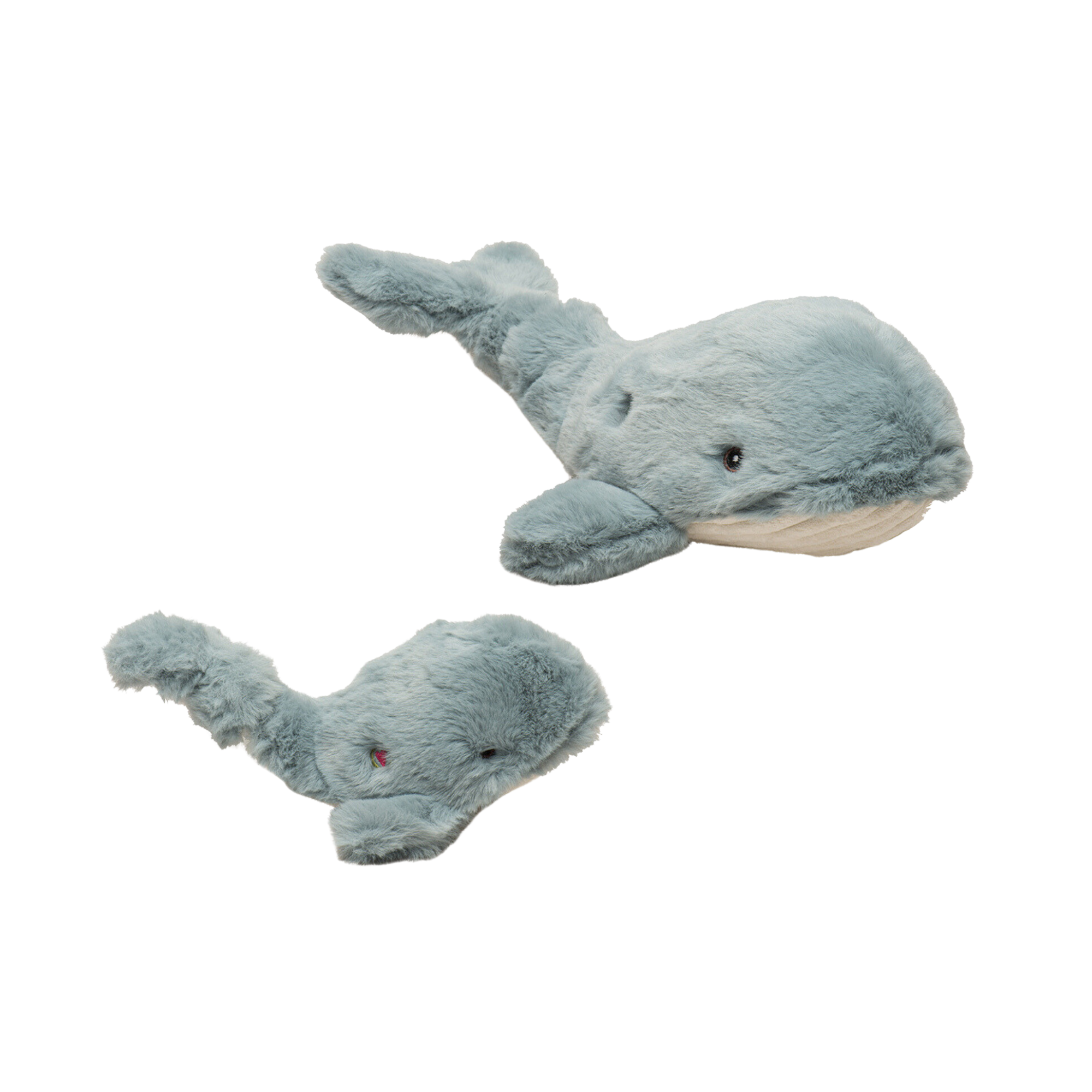 Two plush whale toys on a white background
