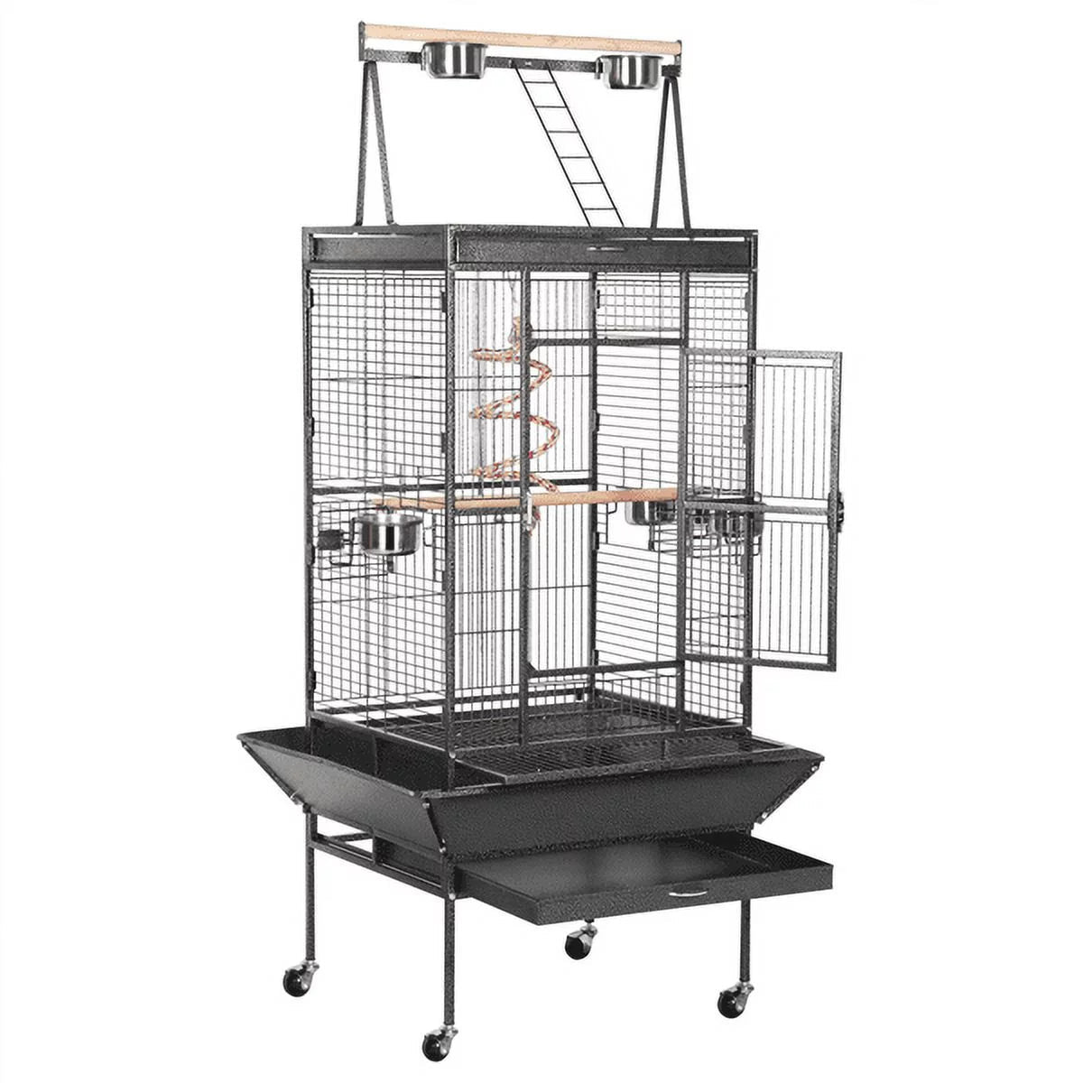 Large bird cage with perches and a stand on a white background