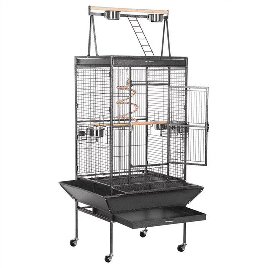 Large bird cage with perches and a stand on a white background