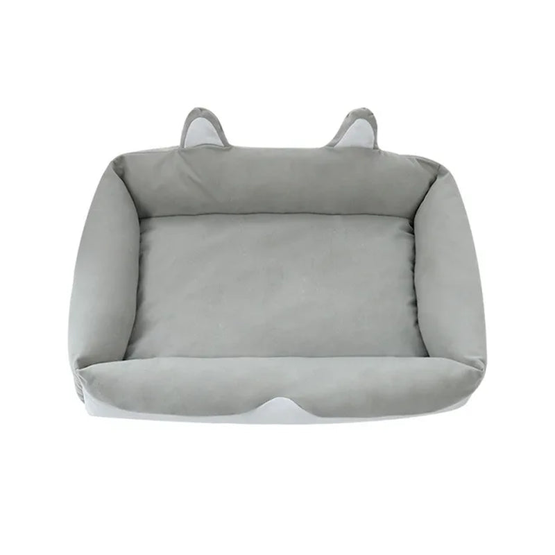 Gray pet bed with ears on a white background