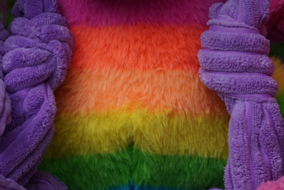 Close-up of colorful fluffy fabric with purple braided textures