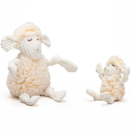 Two white sheep plush toys on a white background