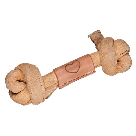 Dog chew toy with leather strap and heart design on a white background