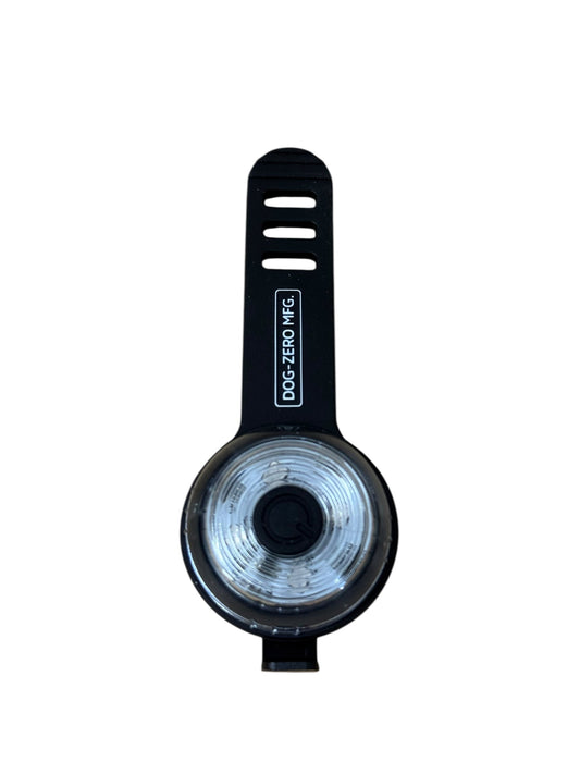 Black bicycle light with a white background