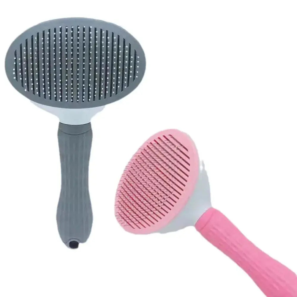 Two pet grooming brushes, one gray and one pink, on a white background.