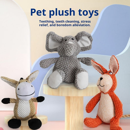Three plush toys including an elephant, donkey, and rabbit on a wooden stand with text about their benefits.