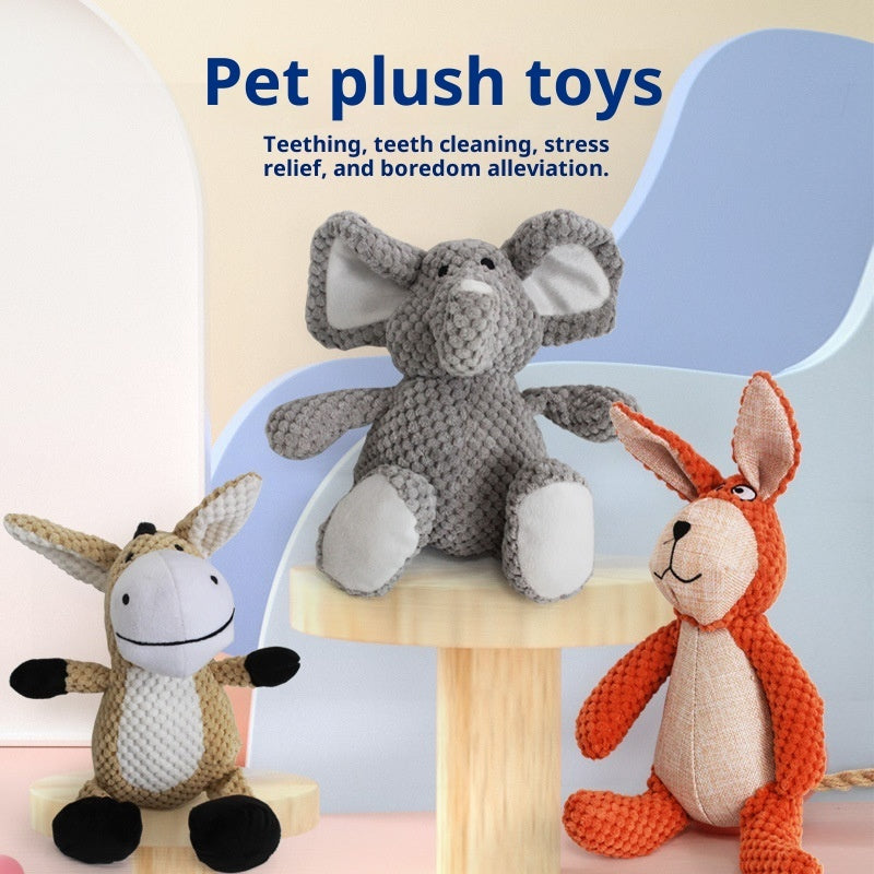Three plush toys including an elephant, donkey, and rabbit on a wooden stand with text about their benefits.