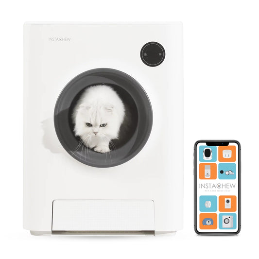 White electronic pet toy with a cat inside and a smartphone displaying app icons on a white background
