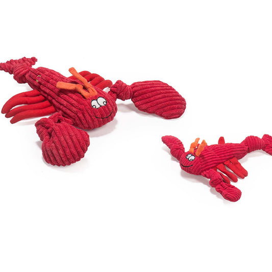 Red lobster-shaped toy with orange accents on a white background