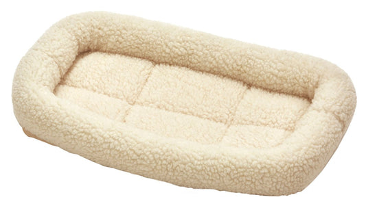 Beige pet bed on a white background