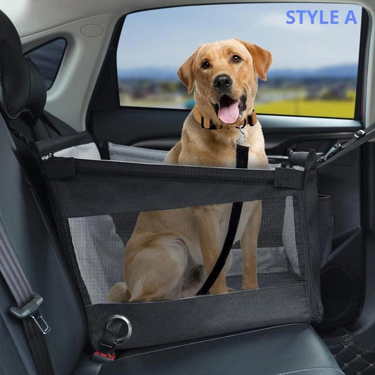 Dog sitting in a car with a black pet safety seat.